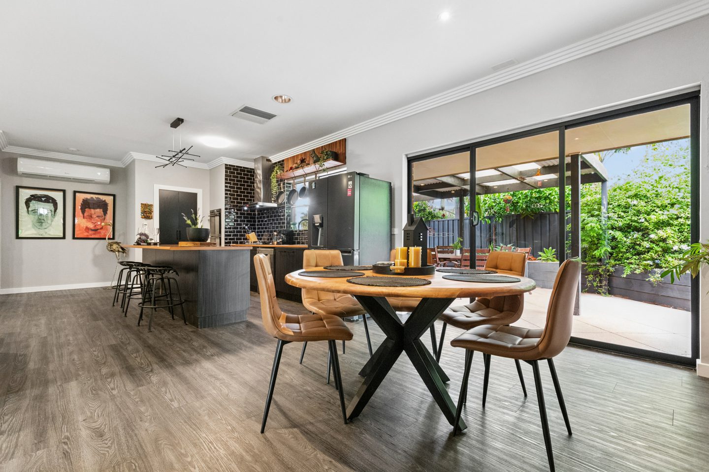 Dining area beside sliding doors to the covered patio