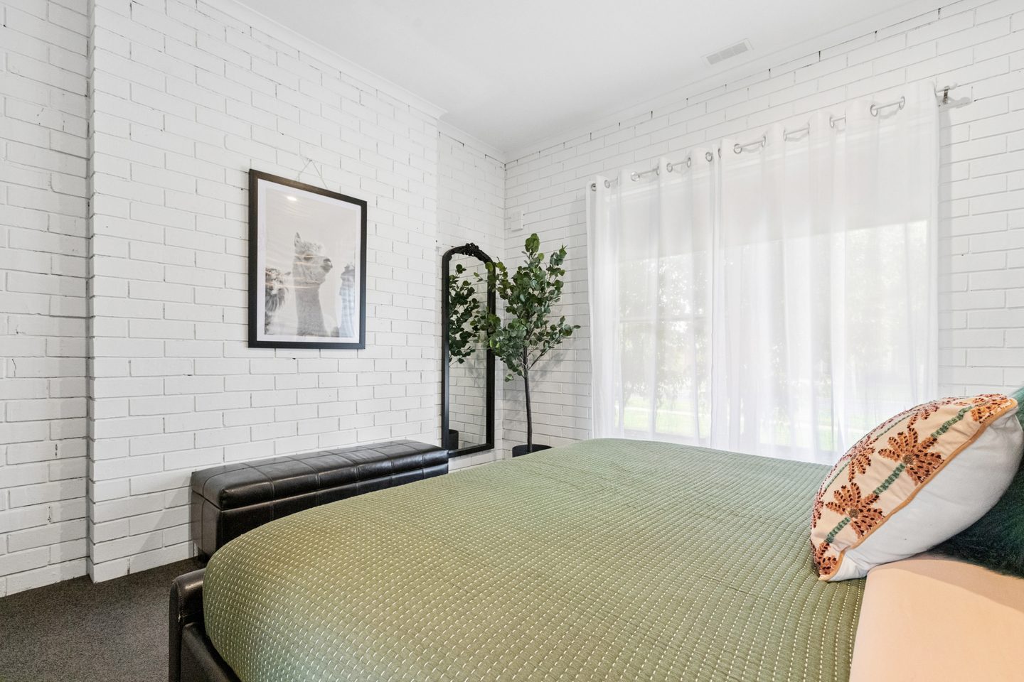 Bedroom window and white brickwork