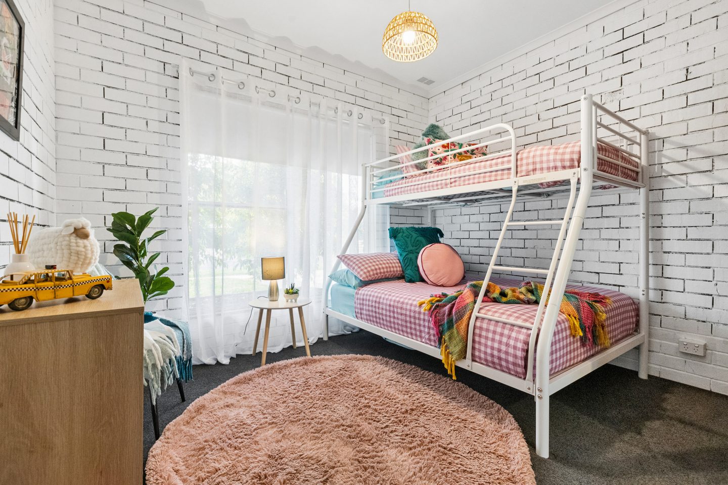 Bedroom with white-painted brick walls