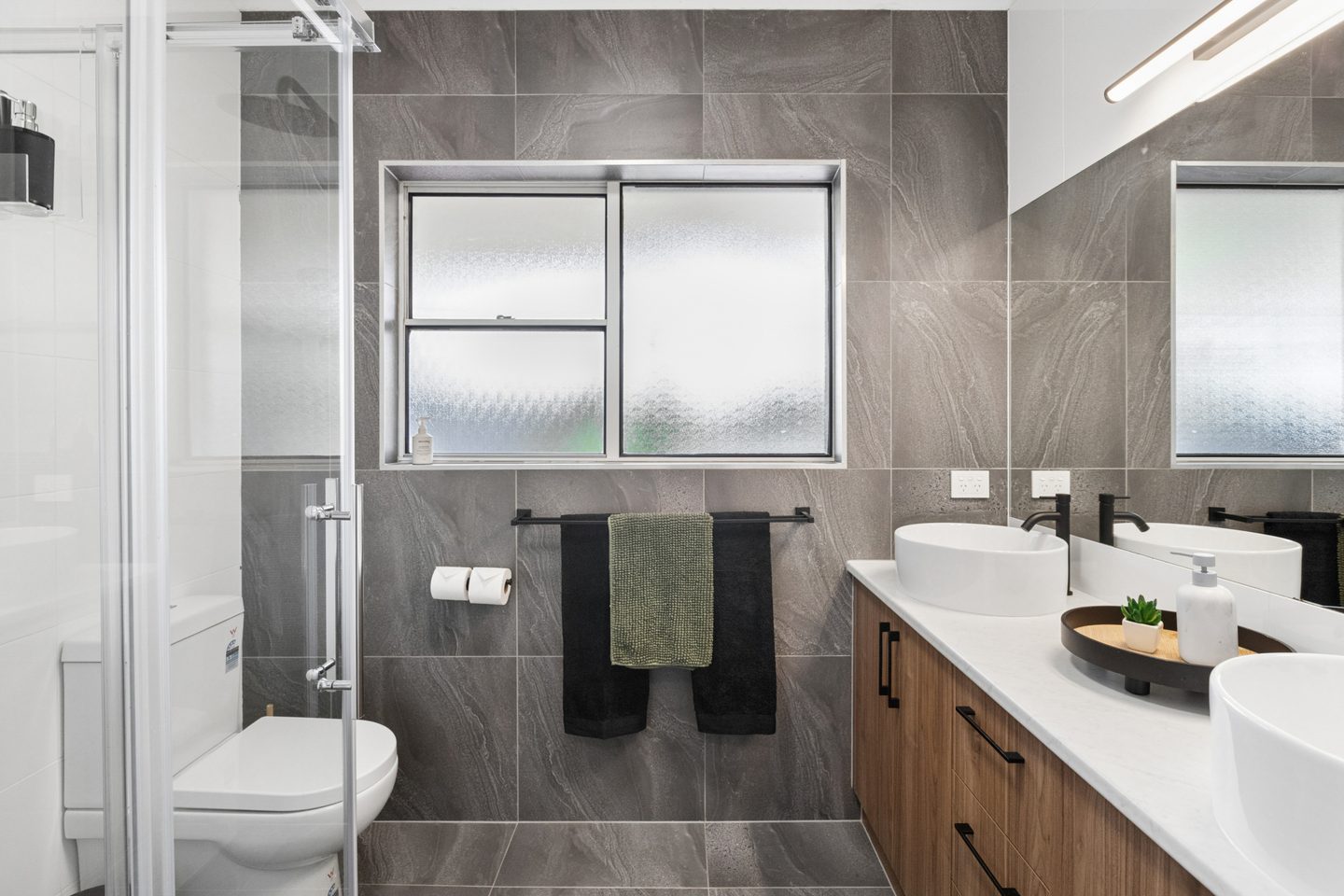 Bathroom vanity, shower and toilet
