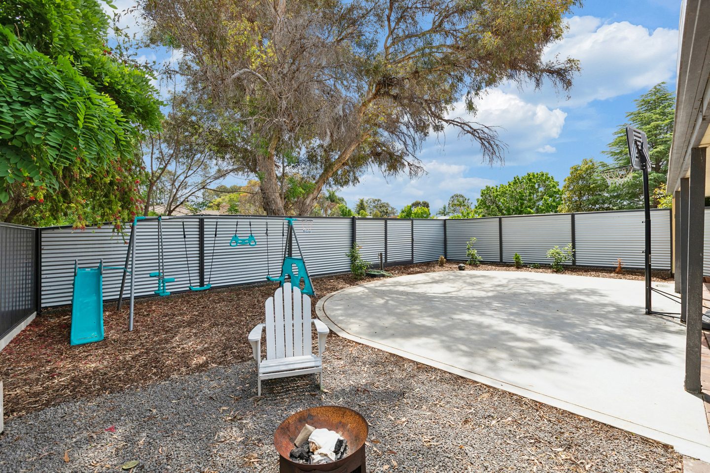 Fenced outdoor spaces beside the court